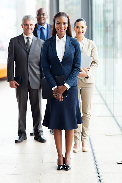 istock african female business leader with team 480288963