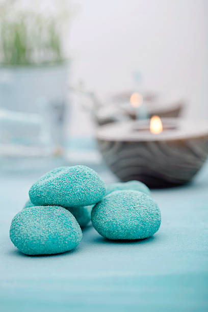 Closeup of spa setting with candles and stones stock photo