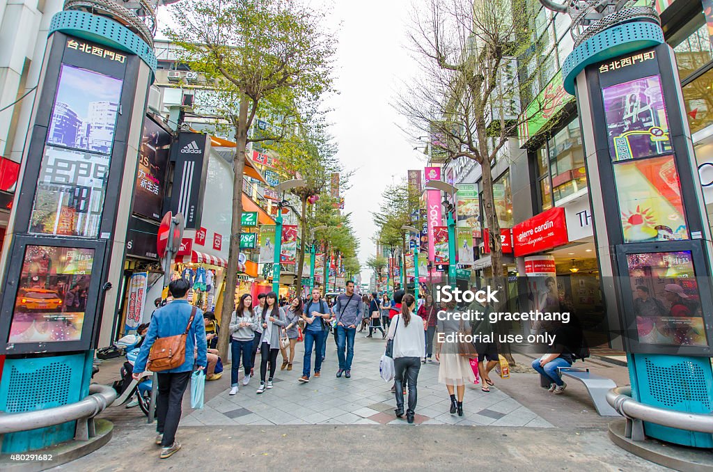 Ximending, Taiwan. Taipei,Taiwan - March 16,2015 : Day scene of the Ximending, it is the source of Taiwan's fashion, subculture, and Japanese culture.People can seen walking and shopping around it. 2015 Stock Photo