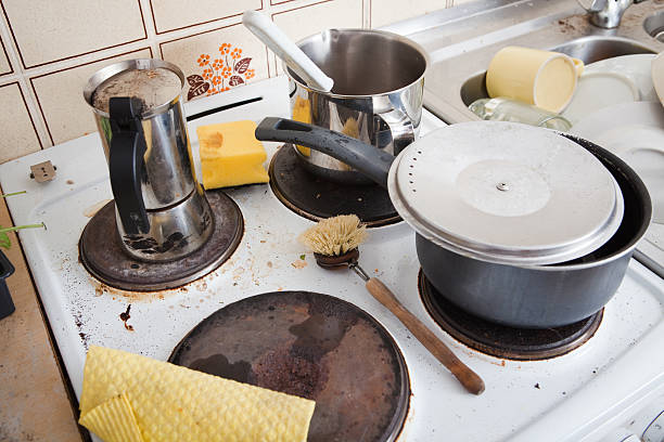 istock messy stove in domestic kitchen with grungy scrubber 480291774