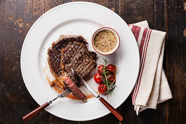 istock Sliced grilled steak Ribeye and Pepper sauce 480292174