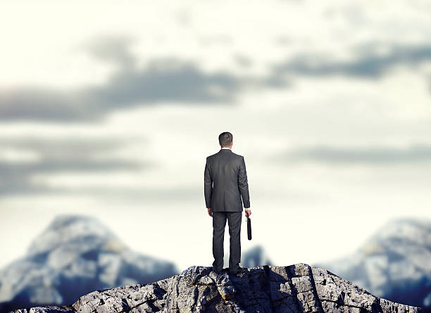 istock Businessman on mountain top 480294904