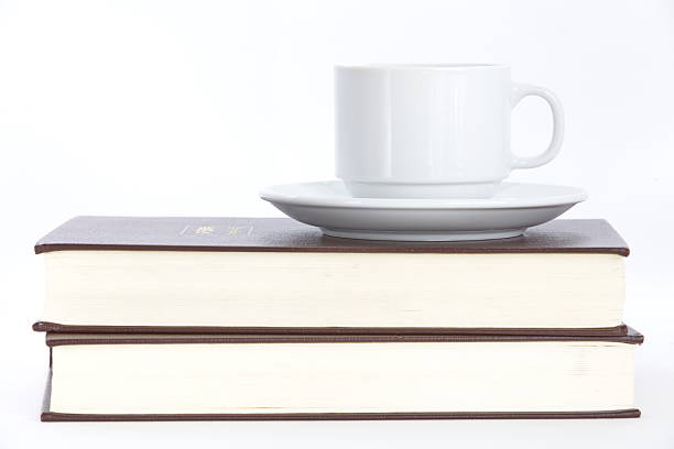 istock Composition with books and cup of coffee isolated on white 480296781