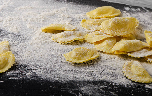 istock Italian  ravioli on a  black table 480296952