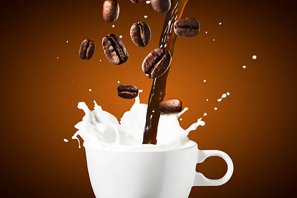 istock Coffee and Milk Splash With Coffee Beans 480297182