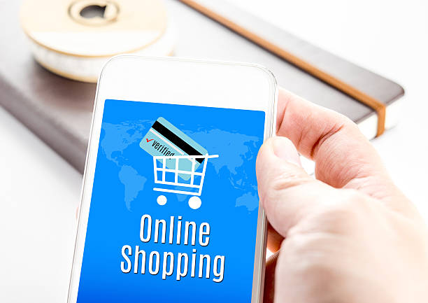 istock Close up hand holding smartphone with Online shopping word 480297316