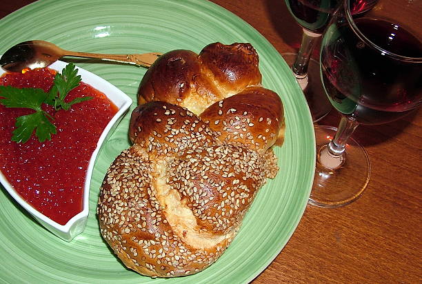 Red caviar, challah and two glasses of wine Red caviar, challah and two glasses of red wine judiaca stock pictures, royalty-free photos & images