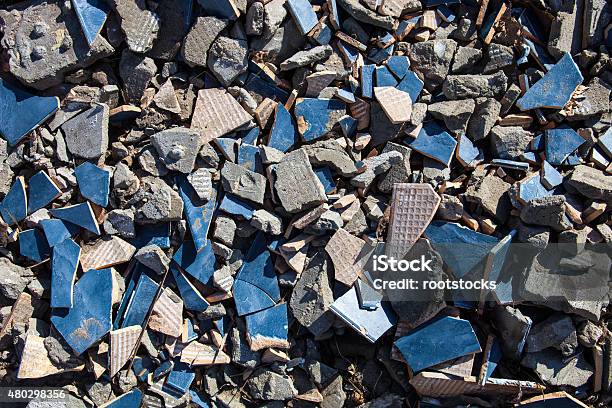 Pieces Of Beaten Tiles And Concrete Blocks Stock Photo - Download Image Now - 2015, Abstract, Backgrounds