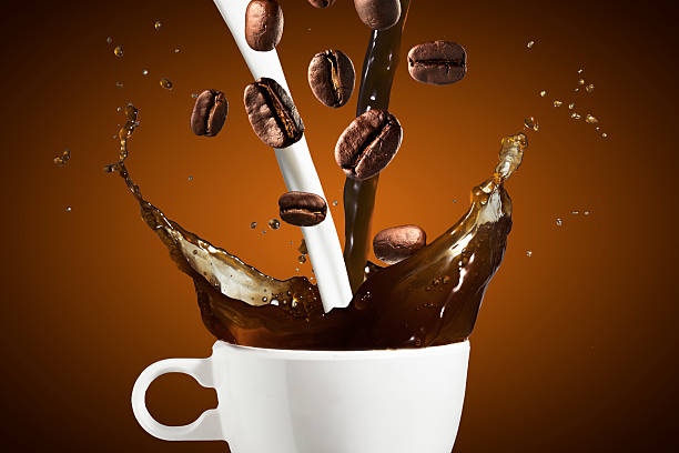 istock Coffee and Milk Splash With Coffee Beans 480299036