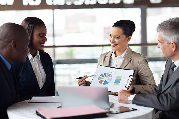 istock business team discussing market share 480303577