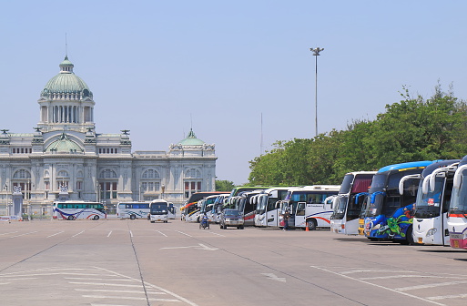 Bangkok Thailnad - April 21, 2015: Tourist buses wait for passengers at Dusit Palace bus parking area in Bangkok Thailand.
