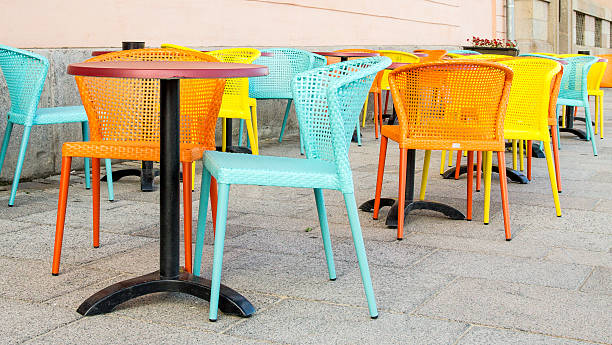 istock Pastel colored chairs on a street cafe 480304586