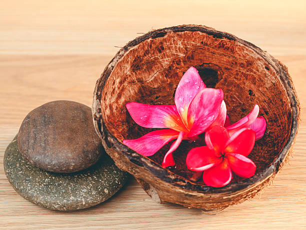 istock Spa stones with frangipani flower. 480305740