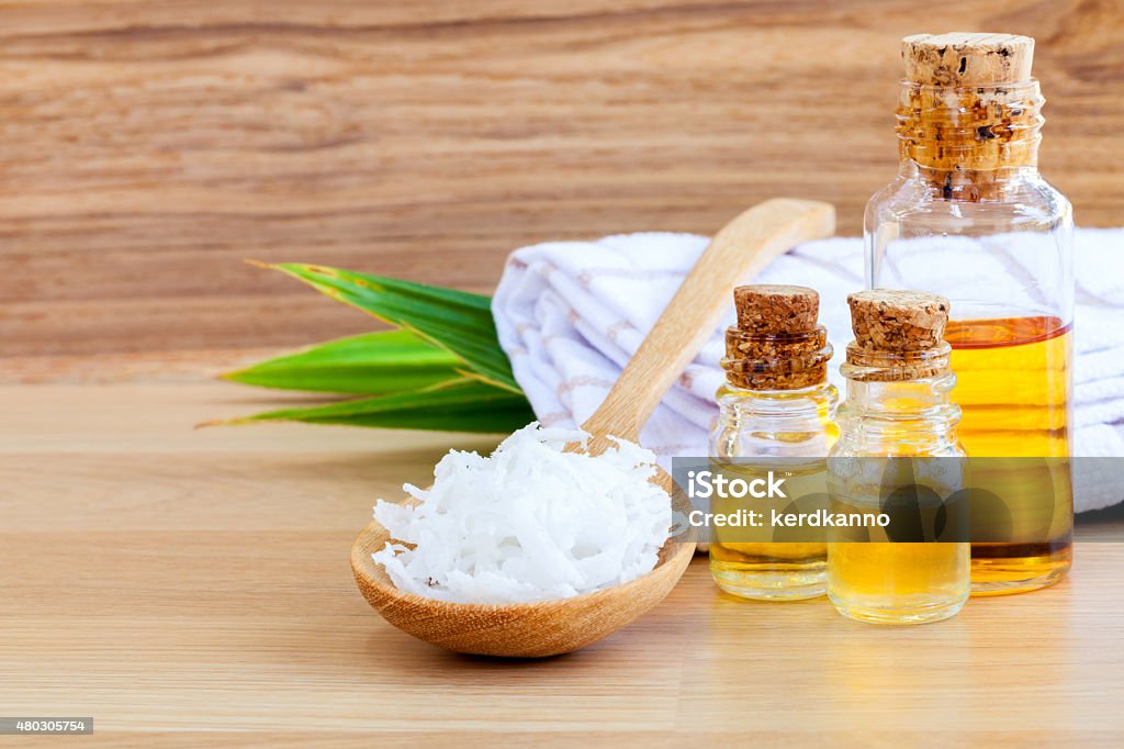 Natural Spa Ingredients . - Coconut essential Oil for alternativ Natural Spa Ingredients . - Coconut essential Oil for alternative therapy. 2015 Stock Photo