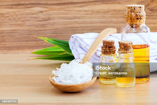 Natural Spa Ingredients Coconut Essential Oil For Alternativ Stock Photo - Download Image Now