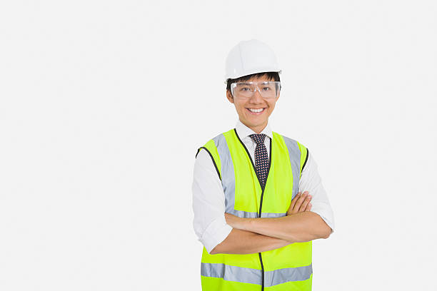 istock Asian construction worker with arms crossed over white background 480307511