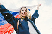 Cheering Woman Under Russian Flag