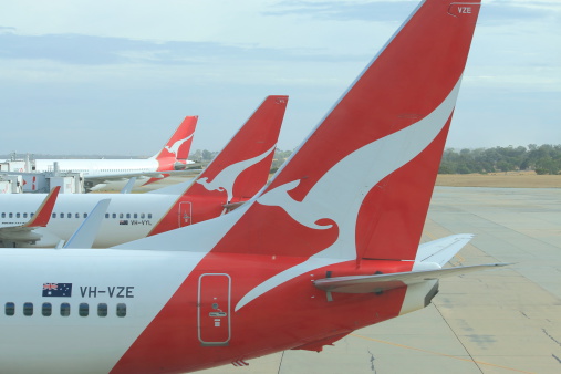 Melbourne Australia- March 14, 2014: Qantas airplanes wait for departure at Melbourne Airport