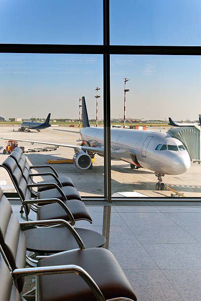 istock Empty armchairs in hall of expectation  airport and plane 480314578