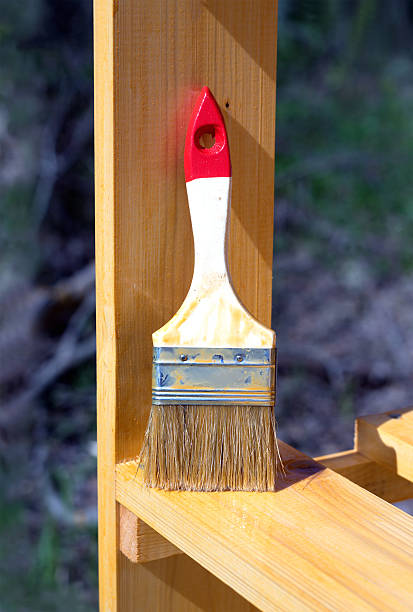 istock Brush stands on a painted wooden shelving surface 480317856