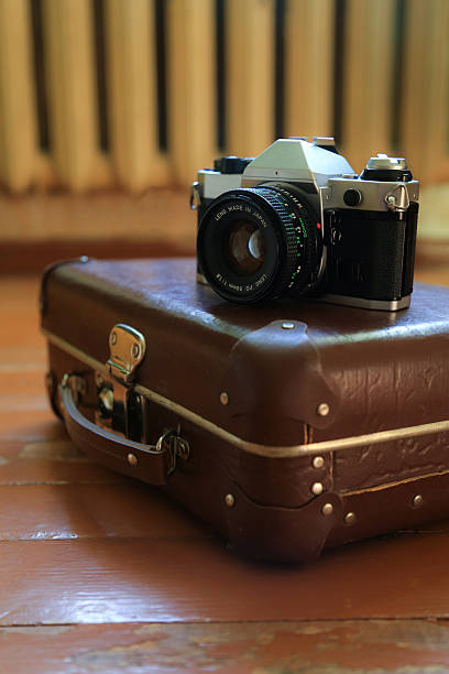 istock suitcase on the floor, retro style,Camera - Photographic Equipment, 480318034