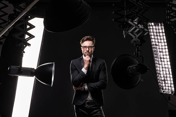 Young fashionable man in photo studio