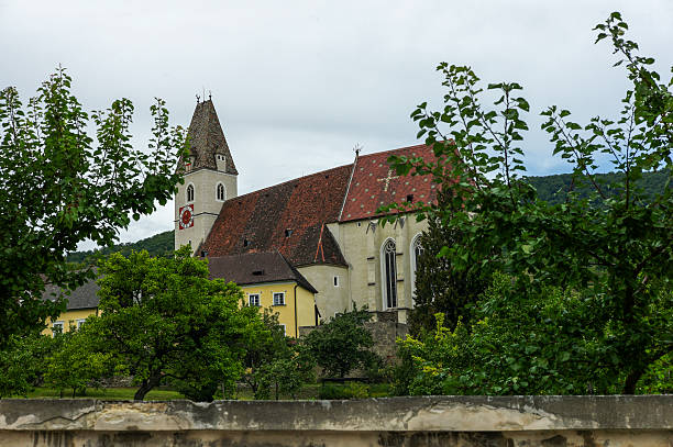 istock old religious christian church at danube river  wachau austria 480320723