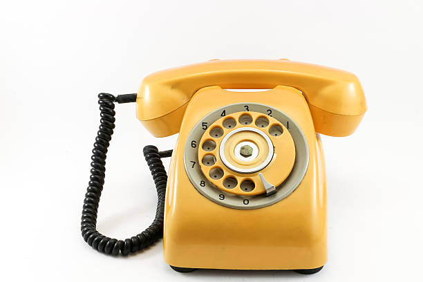 istock Yellow vintage telephone isolated on white background 480322320