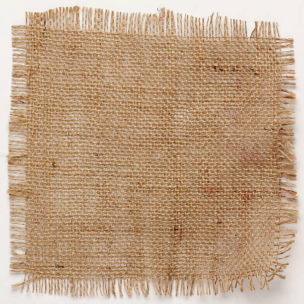 istock texture of Burlap hessian square with frayed edges 480327050