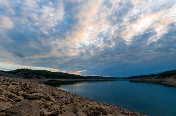 istock Cloudy tropical evening at water reservoir. 480327336
