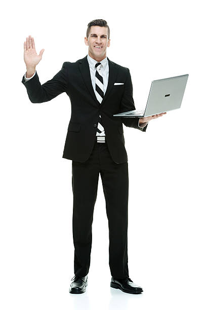 istock Smiling businessman waving hand 480331148