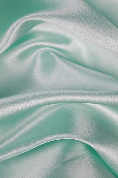 istock Light green Silk cloth of wavy abstract background 480332654