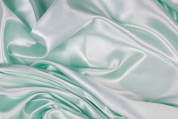 istock Light green Silk cloth of wavy abstract background 480332716