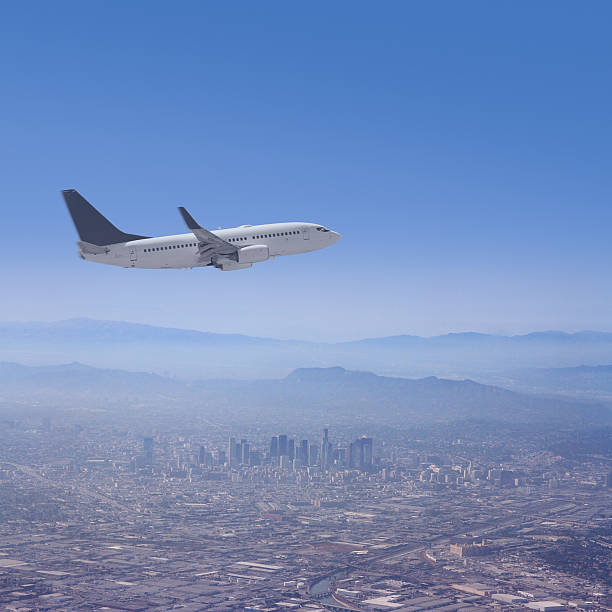 istock Los Angele Skyline with Airplane flying over 480333380