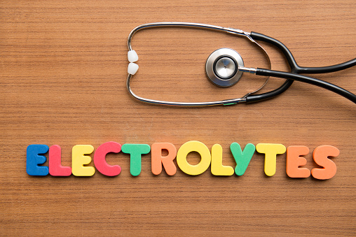 Electrolytes colorful word with stethoscope on the wooden background