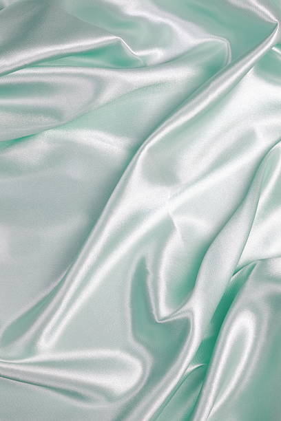 istock Light green Silk cloth of wavy abstract background 480333846