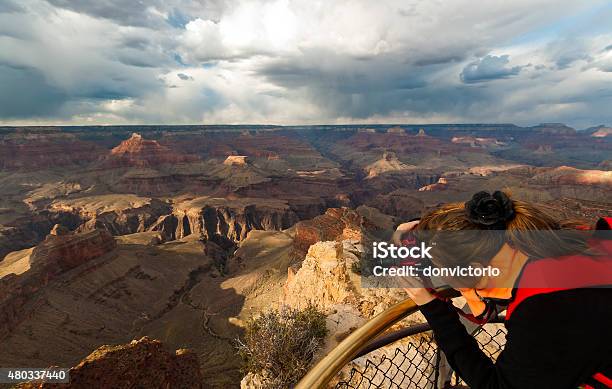 Female Photographer Taking Shot Of Grand Canyon Stock Photo - Download Image Now - 2015, Adult, Aiming