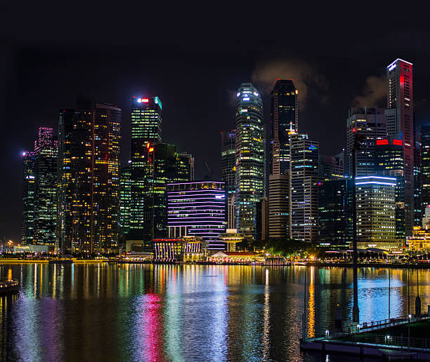 istock Singapore city skyline at night. 480337496