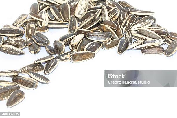 Sunflower Seeds Isolated On White Background Stock Photo - Download Image Now - Agriculture, Appetizer, Backgrounds