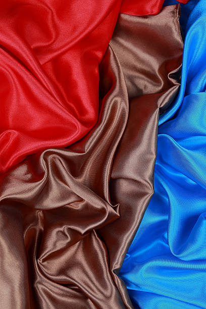 istock Brown and red and blue Silk cloth of wavy abstract backgrounds 480339082