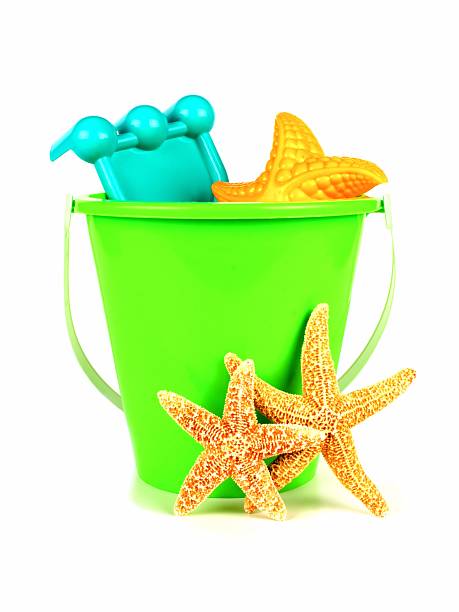 istock Beach toys and starfish over white 480339871