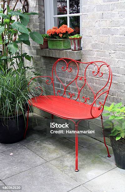 Red Bench Outside On A Patio Stock Photo - Download Image Now - Patio, Furniture, Wrought Iron