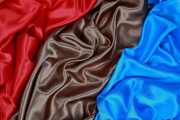 istock Brown and red and blue Silk cloth of wavy abstract backgrounds 480343100