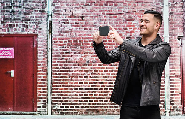 istock Smiling casual man taking a selfie 480346948