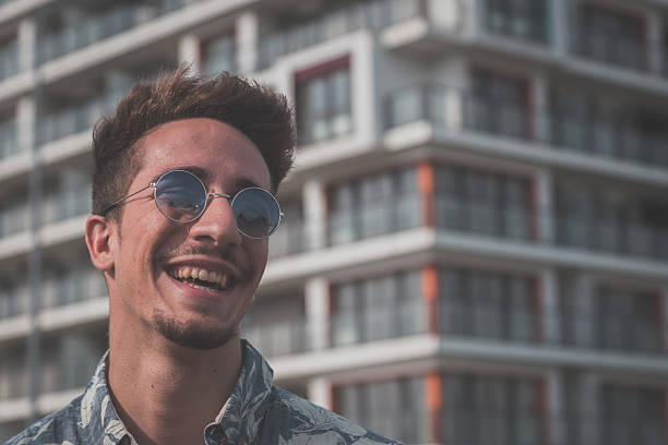 istock Young handsome man posing in the street 480348066