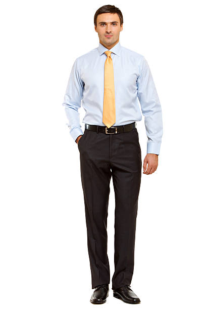 istock Well-dressed man. Charismatic businessman standing on white background 480355113