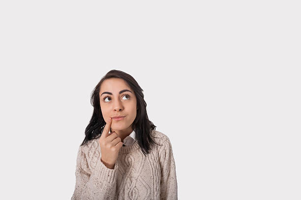 istock Thoughtful businesswoman against gray background 480355335