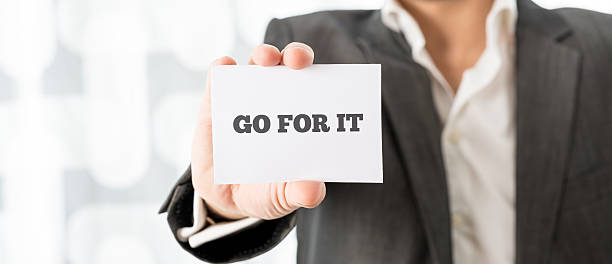 istock Businessman Showing Go For it Message on a Card 480357948