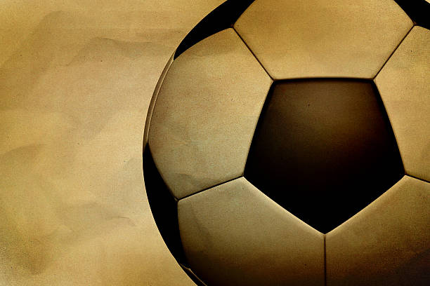 istock Vintage soccer ball on paper grunge background 480359699