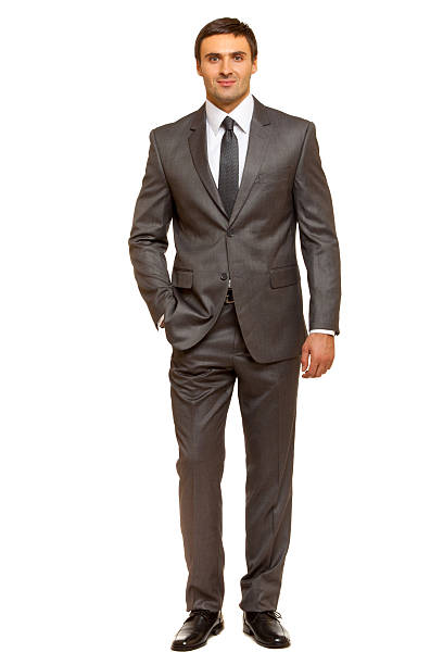istock Well-dressed man. Charismatic businessman standing on white background 480361597